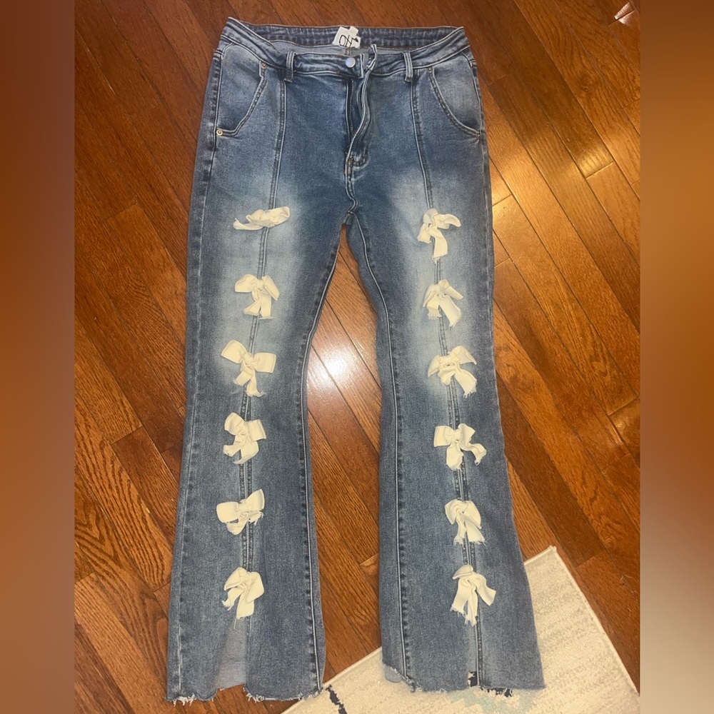 Oli & Hali Blue Denim Wide Leg Jeans with White Bow Accents - Picture 3 of 9